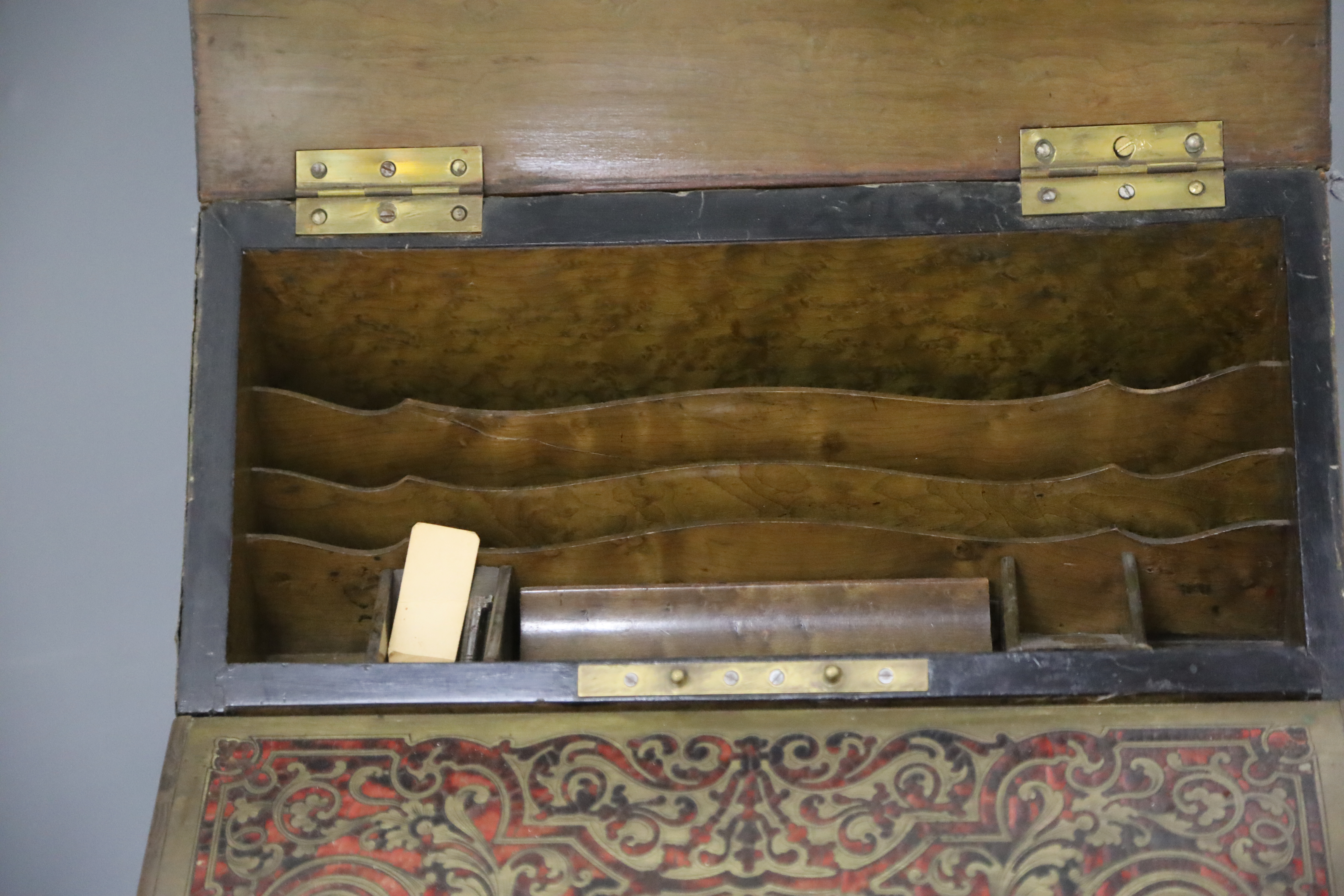 An early 20th century French red boulle work lap desk, width 13in. depth 11.5in. height 8in.